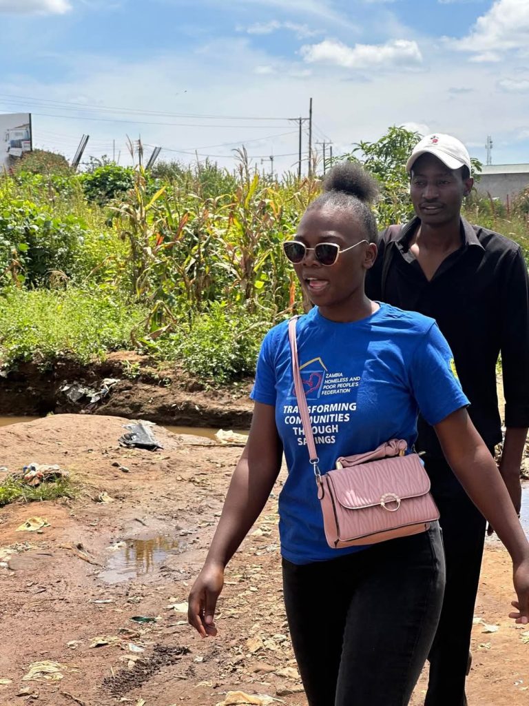 Workshop participants take part in community transect walks as part of the fieldwork activities during the five-day training on STDM.
