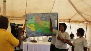 STDM Team member presents the boundary maps of the 7 villages. ©UN-HABITAT/John Gitau