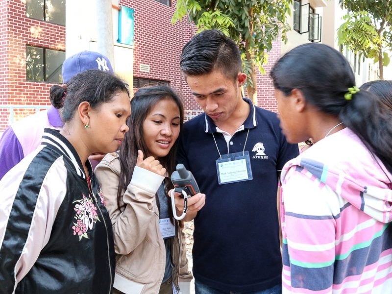 Mark Anthony Deconlay of MILALITTRA (middle) shows how to input data on the GPS tracker.