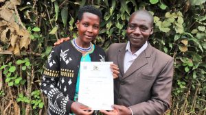 Mr. Nyesigyire Denis and Mrs. Nyesigire Sarah from Kabale District display their Certificate of Customary Ownership issued under the GLTN initiative funded by the Netherlands government