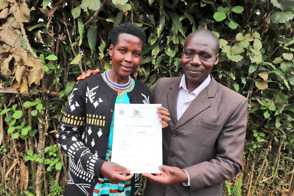 Mr. Nyesigyire Denis and Mrs. Nyesigire Sarah from Kabale District display their Certificate of Customary Ownership issued under the GLTN initiative funded by the Netherlands government