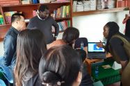 Pamoja Trust and the community in Mashimoni demonstrating the STDM to the Chinese delegation and how it is used to generate social and spatial data in the informal settlements within Kenya