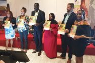Land and GLTN Unit Leader Oumar Sylla (third from left) displaying copies of the GLTN Gender Strategy (2019-2030) with some of the GLTN partners who participated at the launch.