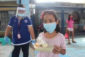 Underweight children under the age of 12 receiving supplemental feeding during the community quarantine to sustain their nutritional needs, a community-based intervention in Valenzuela (photo c/o of HPFPI Valenzuela)